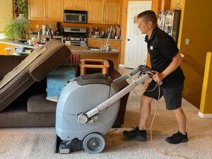 A carpet cleaning machine in a commercial store, showing the progress of carpet cleaning by B's Carpet Cleaning in Saint George, UT.