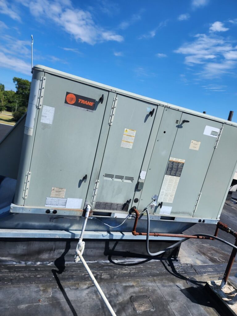 A large commercial Trane HVAC unit installed on a rooftop by Comfort Zone Mechanical in Antioch, TN.