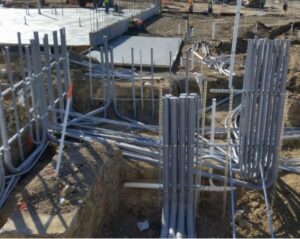 Commercial construction site showing extensive underground conduit and wiring installation by Access Electrical in Indianapolis, IN.
