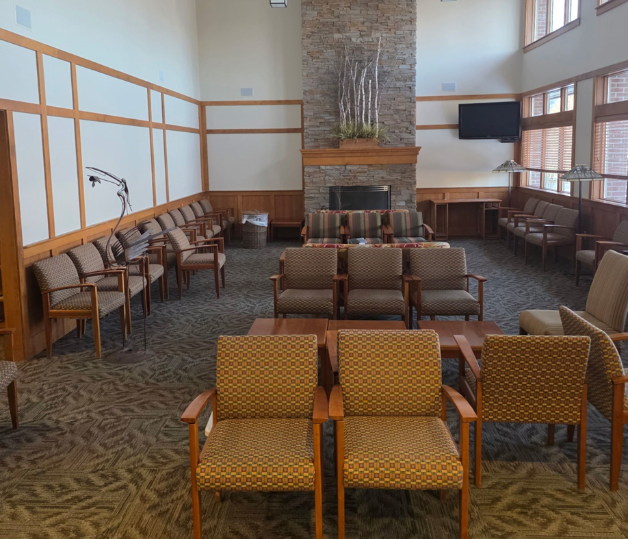 A spacious commercial waiting room with new patterned carpet installed by Absolute Floor Covering, Inc in Kentwood, MI.