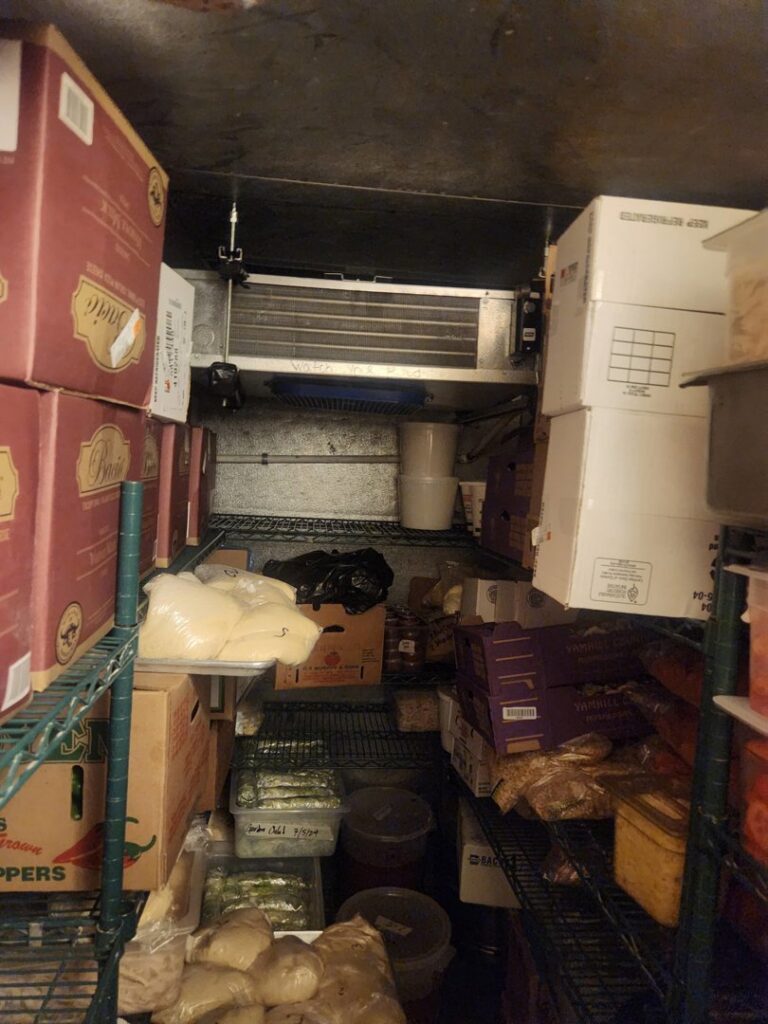 Interior of a commercial walk-in cooler with evaporator coil by HVAC Ministries LLC in Salem, OR