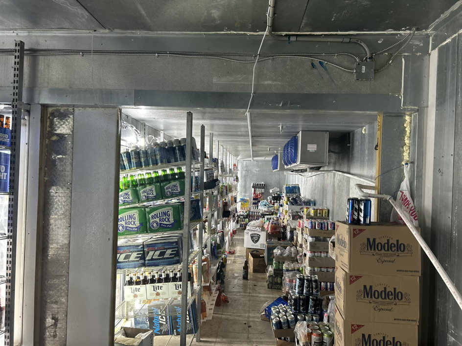Interior view of a commercial walk-in cooler with refrigeration units, a service provided by 511Comfort, LLC in Nashville, TN.