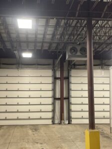A commercial warehouse interior showing an HVAC system installed by A All Temp Inc. Heating & Cooling in Naperville, IL.