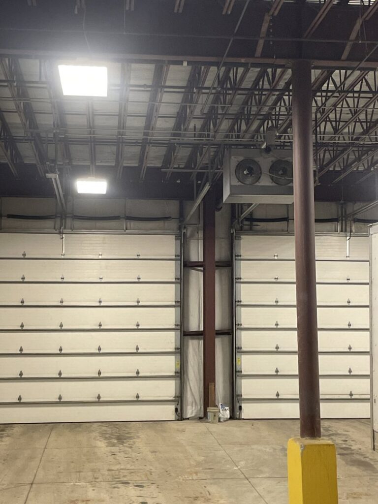 A commercial warehouse interior showing an HVAC system installed by A All Temp Inc. Heating & Cooling in Naperville, IL.