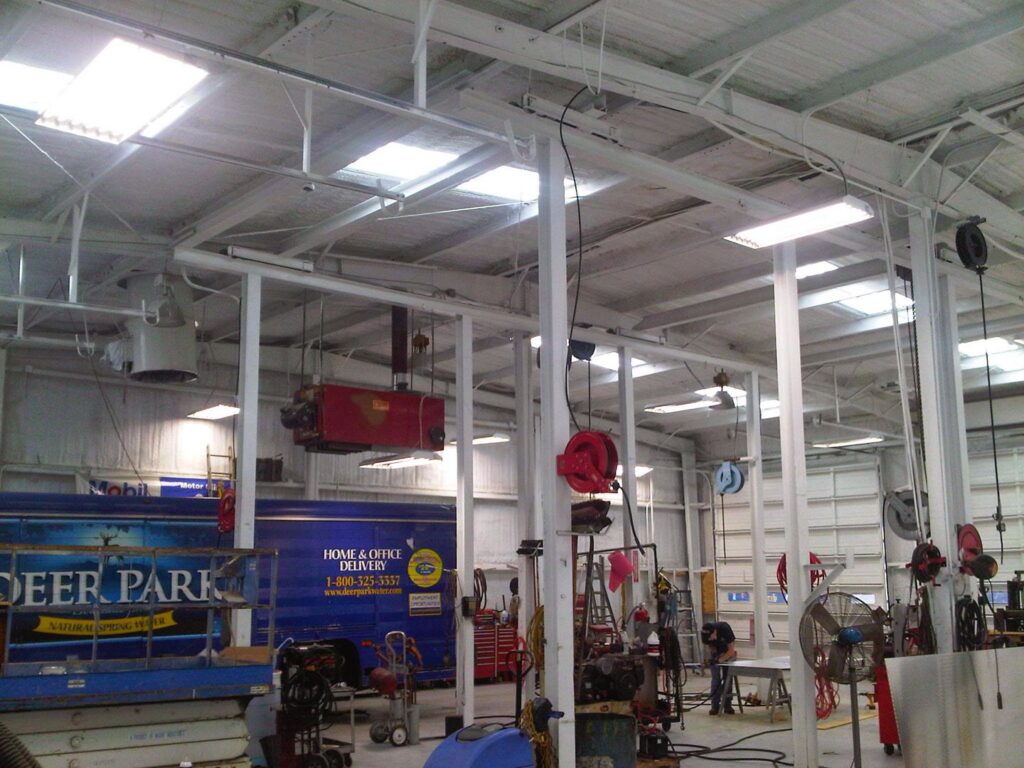 Overhead lighting and electrical infrastructure in a commercial warehouse by Argosy Electric, Inc. in Newport News, VA