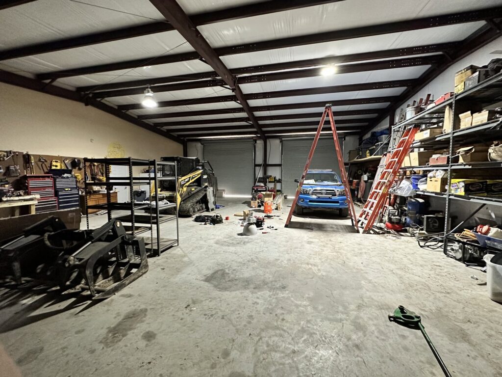 New commercial overhead lighting installation in a large warehouse space by Babcock Electric & Communications in Lake Charles, LA.