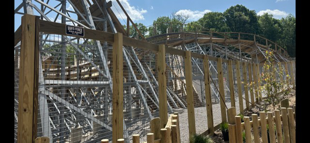 A commercial wood and chain-link fence installation by Van's Fence in Kansas City, MO.