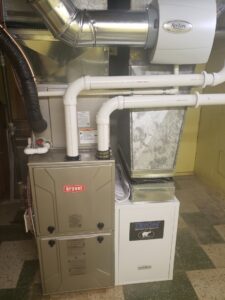A complete HVAC system installation with Bryant furnace, Trion air quality, and Aprilaire humidifier by Proficient Heating & Cooling in Livonia, MI.