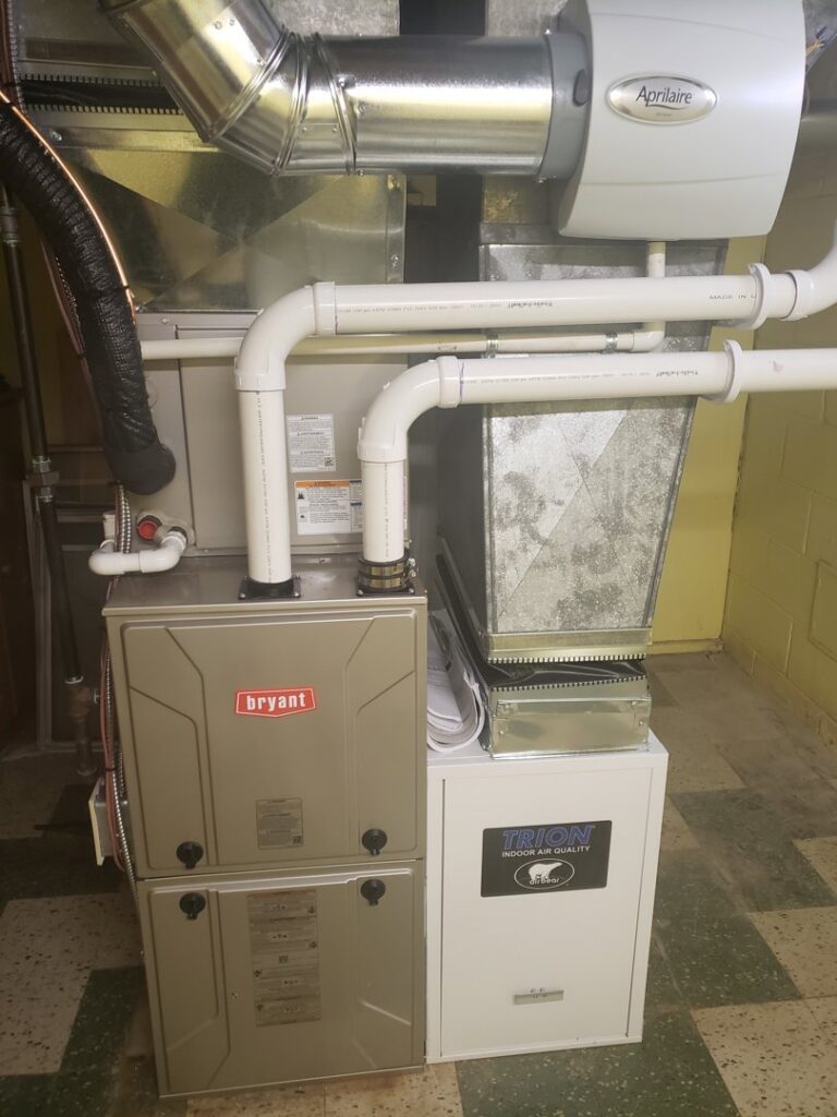 A complete HVAC system installation with Bryant furnace, Trion air quality, and Aprilaire humidifier by Proficient Heating & Cooling in Livonia, MI.