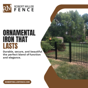 A newly installed black ornamental iron fence in a backyard by Robert Miller Fence in Indianapolis, IN.