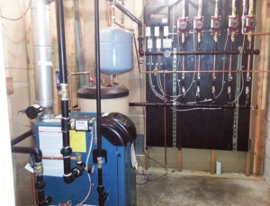 A completed boiler and hydronic heating system installed by Antigua Mechanical, an HVAC contractor in Manchester, NJ.