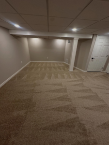 A completed carpet installation in a room, showcasing clean lines and texture by Ordonez Flooring and Installation in Lewis Center, OH.