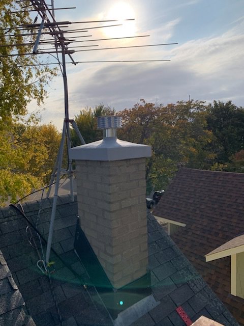 A completed chimney service project with new cap and flashing by JJ Chimney Services in Minneapolis, MN.