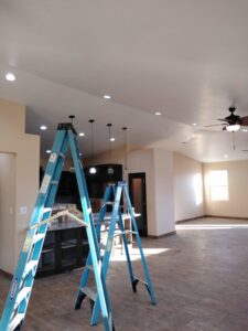 Completed electrical lighting installation, including recessed lights and pendant fixtures, by The Specialist Electrical Contractor in Albuquerque, NM.