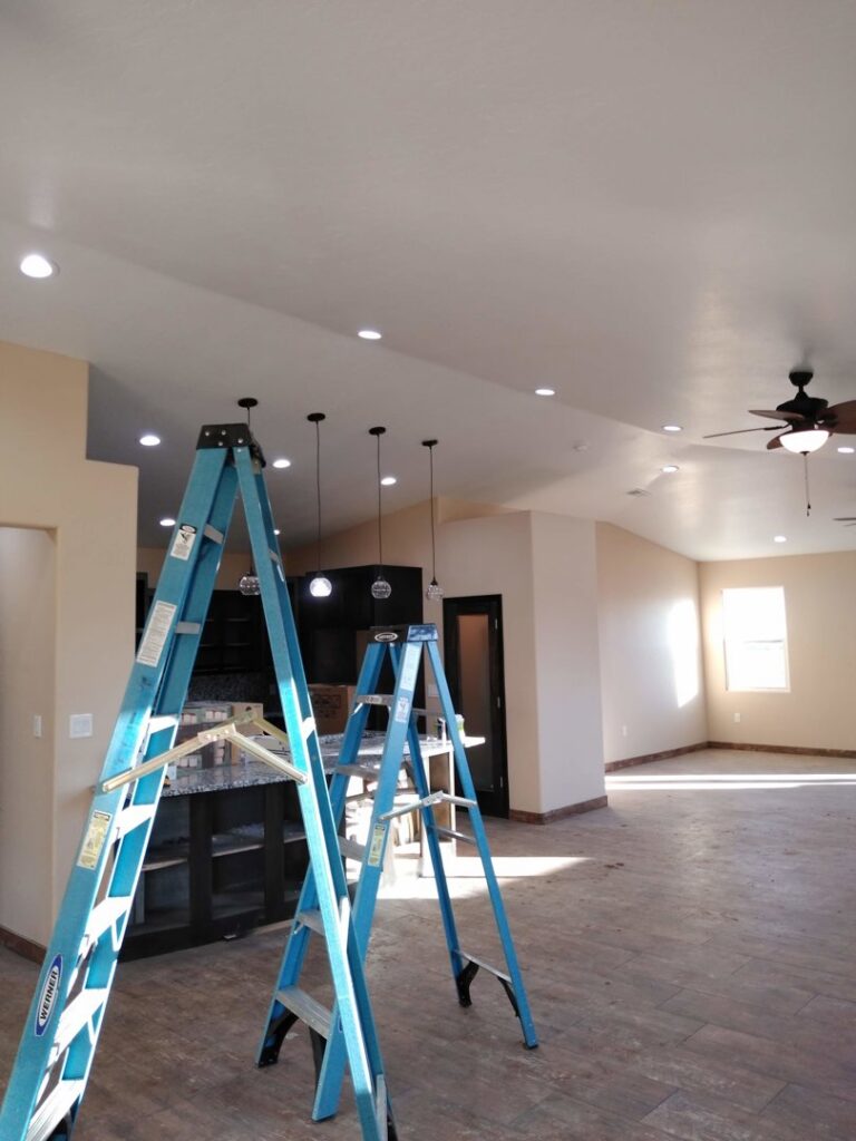 Completed electrical lighting installation, including recessed lights and pendant fixtures, by The Specialist Electrical Contractor in Albuquerque, NM.