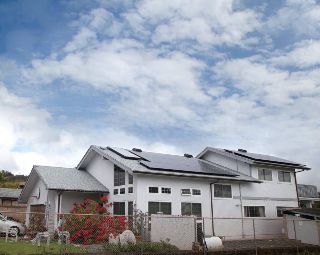 A completed solar panel system installed on a residential roof by Alternate Energy Inc. in Pearl City, HI.