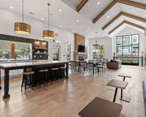 A spacious room featuring a completed wood-look flooring installation by Keystone Carpet & Tile in Omaha, NE.