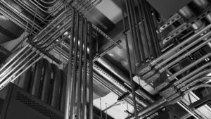 Intricate electrical conduit and wiring installed on a ceiling, showcasing expert work by RSL Electric LLC in York, PA.