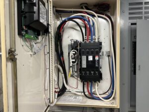 Detailed view of complex electrical panel wiring by North Springs Electric Company in Sandy Springs, GA.