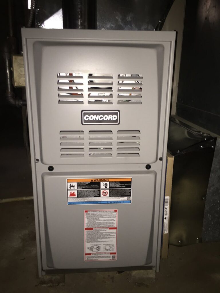 A close-up view of a Concord brand furnace or air handler unit, installed by Adams Heating and Cooling in Schenectady, NY