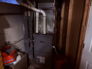 A Concord brand furnace system with ductwork and piping installed by JR HVAC and More LLC in Parma, OH.