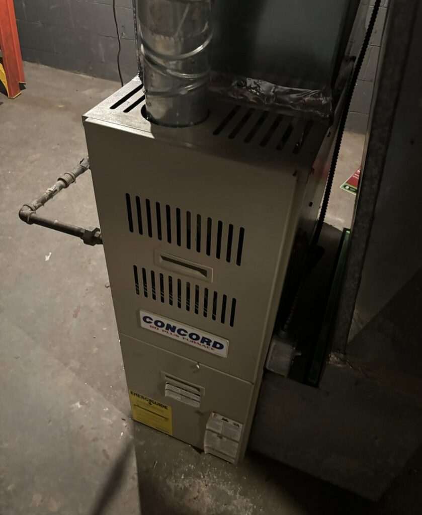 A Concord brand furnace and associated ductwork installed by Lyons Heating and Cooling in Lyons, OR.