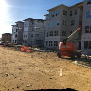 Construction debris and materials on a building site, indicating a general junk removal job by Stellar HVAC in Lawrenceville, GA.