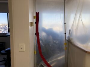 A plastic containment area set up for mold remediation by Air Care & Restoration Co. in Bethlehem, PA.