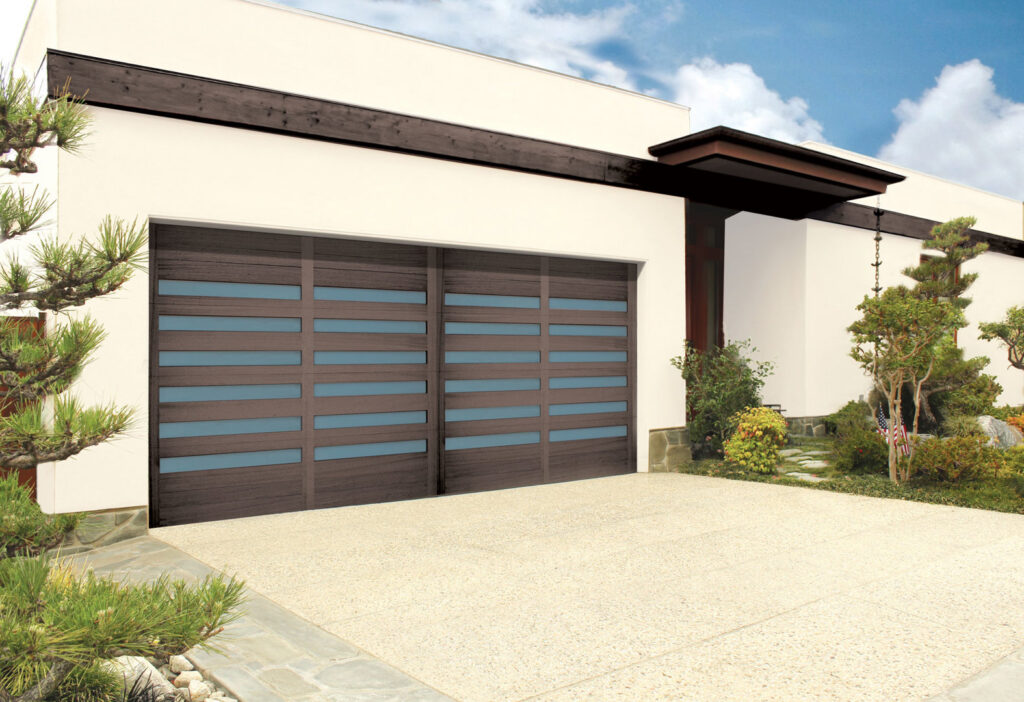 Two contemporary garage doors with horizontal panels installed by American Overhead Door in Madison, AL