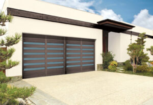 Two contemporary garage doors with horizontal panels installed by American Overhead Door in Madison, AL