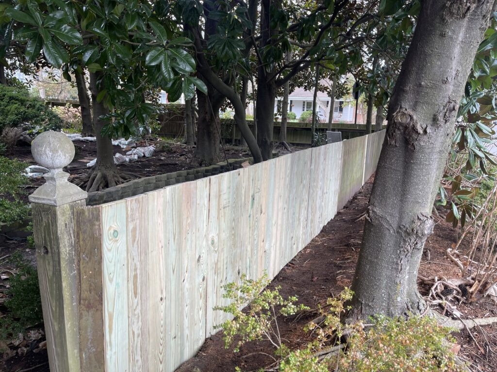 Copper pipes and metal ductwork visible through an opening in a wall, indicating HVAC installation by After Hours Home Services in Hampton, VA.
