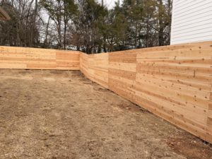 A corner section of a new wood privacy fence installed by Old School Fence Co. in Springfield, MO.