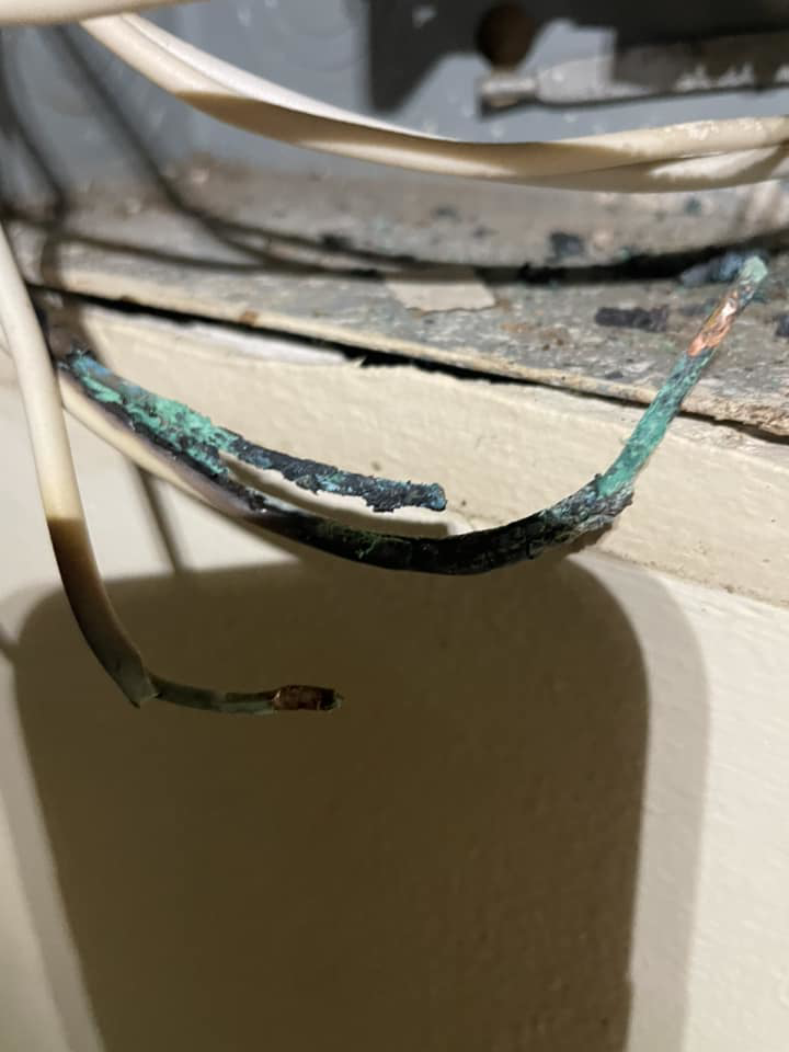 Severely corroded and damaged electrical wires requiring repair by Charging Rhino Electric in Mobile, AL