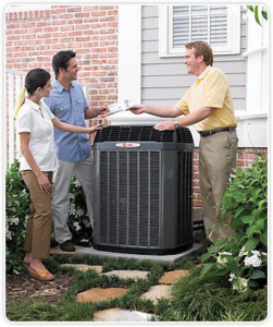 A couple discussing an outdoor HVAC unit with a technician from Universal Mechanical Contractor's,Inc. in Lynn, MA