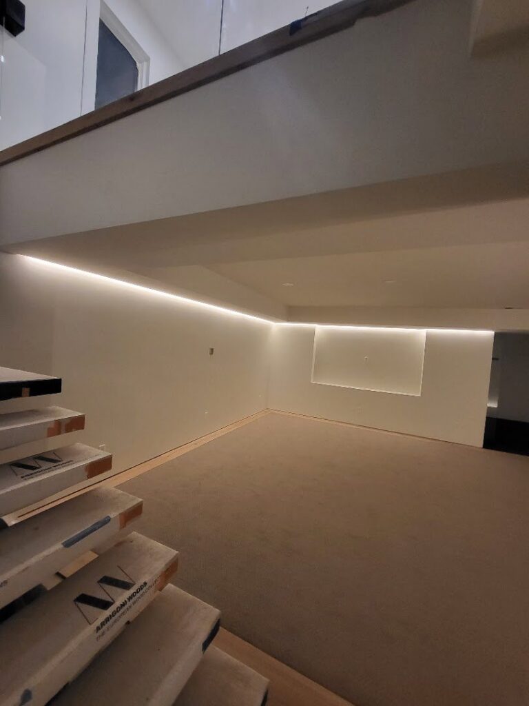 Modern cove lighting installation illuminating a room by Next Level Pros in Lakewood, CO.