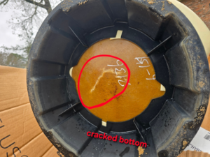 Close-up of a cracked pool filter component, indicating a repair need by All N One Pools,LLC in Lafayette, LA.