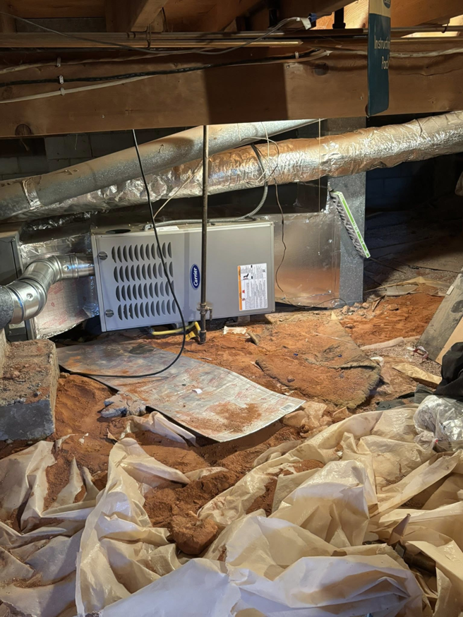 A crawl space air handler installation by Premier HVAC/ Small appliance in Brooklyn, NY.
