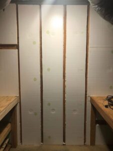 Insulation installed in a crawlspace wall, part of crawlspace solutions by Central Virginia Exterminating & Crawlspace Solutions in Dillwyn, VA.