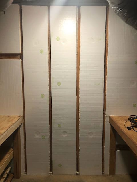 Insulation installed in a crawlspace wall, part of crawlspace solutions by Central Virginia Exterminating & Crawlspace Solutions in Dillwyn, VA.