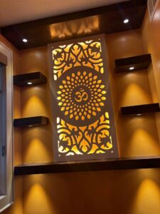 Custom decorative wall panel with backlighting and recessed lights installed by Amped Electric in Virginia Beach, VA.