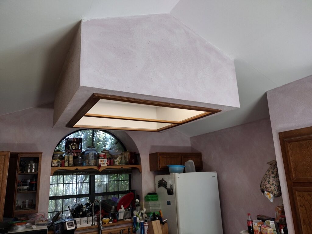 Custom kitchen ceiling light fixture installation completed by A Helping Hand Handyman Services, providing electrician services in Chicago, IL.