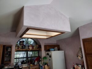 Custom kitchen ceiling light fixture installation completed by A Helping Hand Handyman Services, providing electrician services in Chicago, IL.