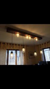 Custom mason jar light fixture installed on a ceiling by John Fean Electrician Inc. in Philadelphia, PA.