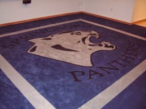 Custom logo carpet installation featuring 'Springboro Panthers' by Pages Flooring in Springboro, OH.