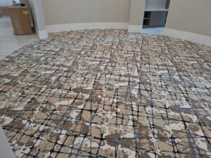 Custom patterned carpet installed in a large room by Palmetto Carpet Company in Miami, FL.