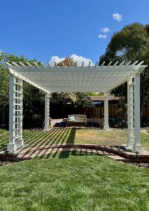 A custom wood fence with an integrated built-in bench by Jaz Builders Inc in Santa Clara, CA.