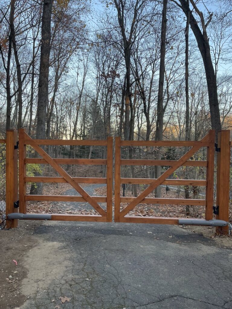 A custom wooden double entry gate installed by RP Fencing & Gates in Brewster, NY