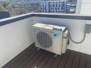 A Daikin air conditioning unit installed on a rooftop deck by JN Heating & Cooling in Eure, NC