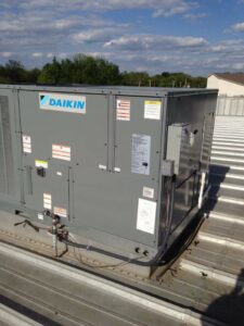 A large Daikin commercial rooftop HVAC unit installed by Griffin's Heating & Air in Tulsa, OK.
