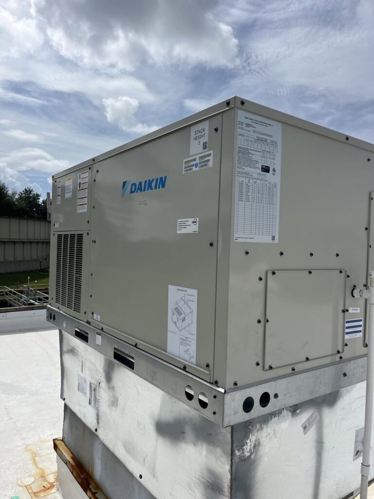 A Daikin commercial rooftop HVAC unit installed by McGuffee's Air Conditioning and Heating in Gulfport, MS